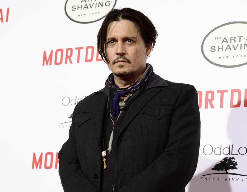 In this Jan. 25, 2015 file photo, actor Johnny Depp attends the premiere of the feature film "Mortdecai" in Los Angeles.  