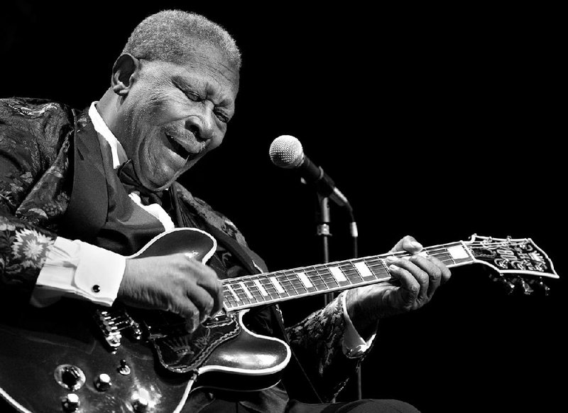 In this photo taken April 30, 2008, blues great B.B. King performs at the Florida Theatre in Jacksonville, Fla. King died peacefully in his sleep late Thursday at his Las Vegas home. He was 89. 