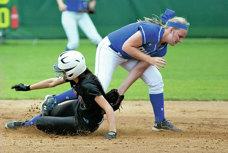 Special to NWA Democrat-Gazette/DAVID BEACH Mallory Theel of Bryant tags Reagan Sperling of North Little Rock out Saturday during the 7A semifinal at Veterans Park in Rogers.