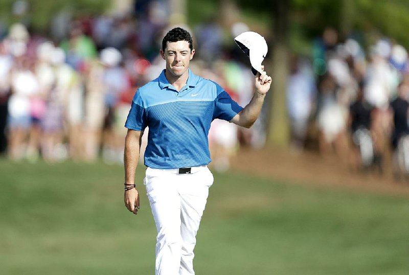 World No. 1 Rory McIlroy acknowledges the crowd during the final round of the Wells Fargo Championship on Sunday. McIlroy closed with a 3-under 69 to cruise to a seven-stroke victory and become the tournament’s first two-time winner.