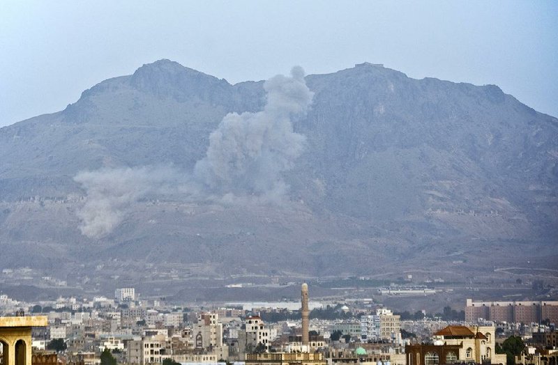 Smoke rises after a Saudi-led airstrike hit a site believed to be one of the largest weapons depots, on the outskirts of Yemen’s capital, Sanaa, on Tuesday. 