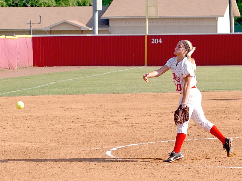 MARK HUMPHREY ENTERPRISE-LEADER Farmington senior Mackenzie Sill pitches against Harrison. The Lady Cardinals swept the Goblins in a double-header on May 7, in the final 5A West league game of the season.