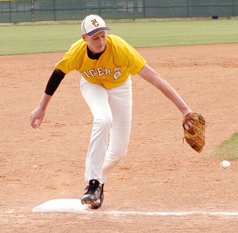 MARK HUMPHREY ENTERPRISE-LEADER Prairie Grove junior Logan Gragg goes after an infield hit. The Tigers were eliminated from the State 4A baseball tournament on Thursday, 11-4, by defending champion Arkadelphia.