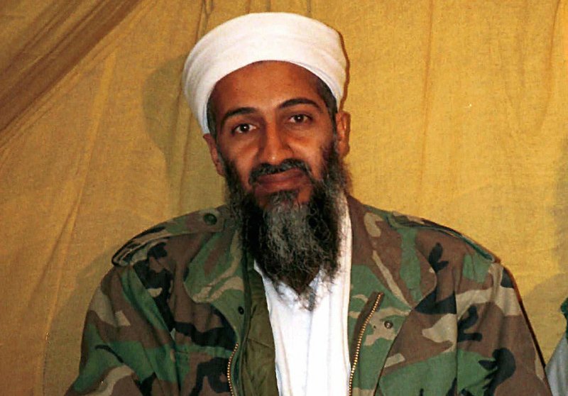 FILE - This undated file photo shows al Qaida leader Osama bin Laden in Afghanistan. U.S. intelligence officials have released more than 100 documents seized in the raid on Osama bin Laden’s compound, including a loving letter to his wife and a job application for his terrorist network. The Office of the Director of National Intelligence says the papers were taken in the Navy SEALs raid that killed bin Laden in Pakistan in 2011. 