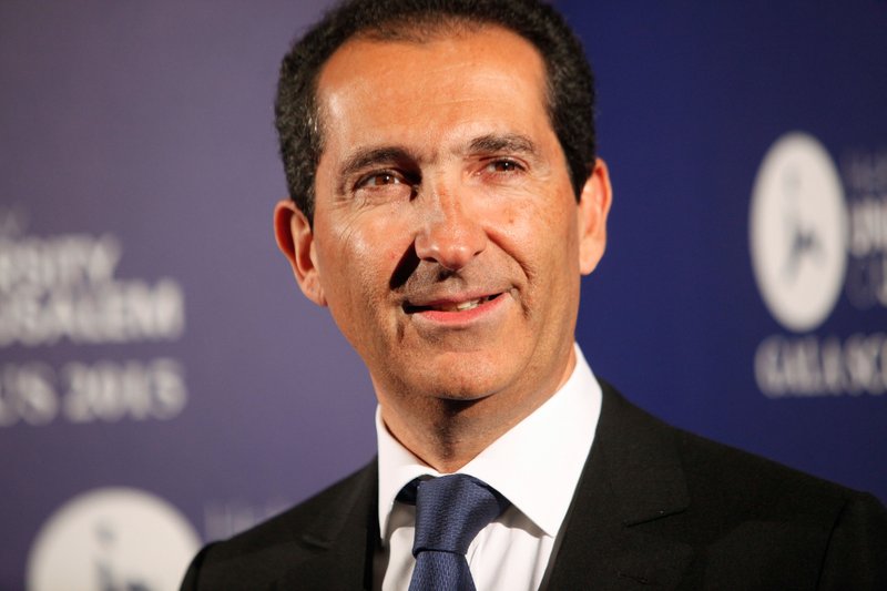 In this Wednesday, March 18, 2015 file photo, Altice group's Chairman Patrick Drahi poses for photographers at the Scopus Awards of the French Friends of the Hebrew University, in Paris, France. Luxembourg-based Altice SA said Wednesday MAY 20, 2015 it will buy 70 percent of Missouri-based cable TV provider Suddenlink with a combined debt and cash offer from existing owners BC Partners and CPP Investment Board, and company management.