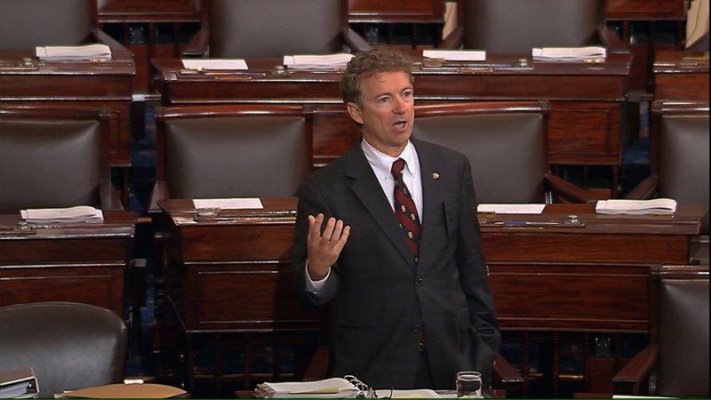 In this image from Senate video, Sen. Rand Paul, R-Ky., and a Republican presidential contender, speaks on the floor of the U.S. Senate Wednesday afternoon, May 20, 2015, at the Capitol in Washington, during a long speech opposing renewal of the Patriot Act. Paul claimed he was filibustering, but under the Senate rules, he wasn't.