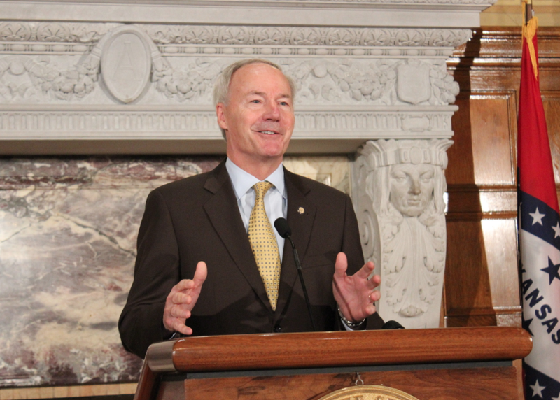 Gov. Asa Hutchinson speaks Thursday at a news conference.