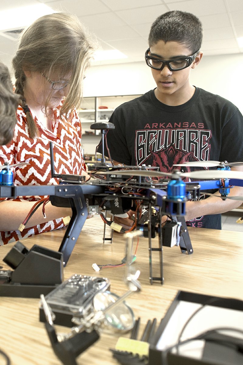 Sophia Totten, left, and Madison Burke work on an unmanned aerial vehicle (UAV) in Chad Mercado’s class at Beebe High School.