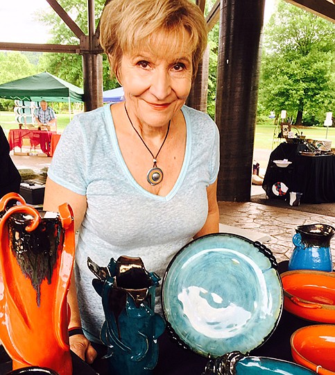 Submitted photo COLORFUL COOKWARE: Vendor Claire Green CoeudiVez will offer her Claire's Clay stoneware pottery during Saturday's shopping hours at the Hot Springs Farmers & Artisans Market, and musician Tony Nardi will play bluesy tunes beginning at 9 a.m.