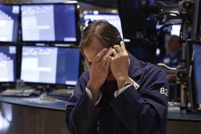 Trader Dudley Devine works on the floor of the New York Stock Exchange Thursday, May 21, 2015. U.S. stocks edged higher in early trading. Energy stocks rose more than the rest of the market as the price of oil climbed.
