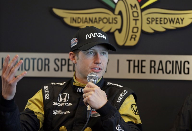 Ryan Briscoe, of Australia, answers a question about replacing James Hinchcliffe for the Indianapolis 500 auto race during a press conference at Indianapolis Motor Speedway in Indianapolis, Thursday, May 21, 2015. Hinchcliffe was injured in a crash on Monday. 