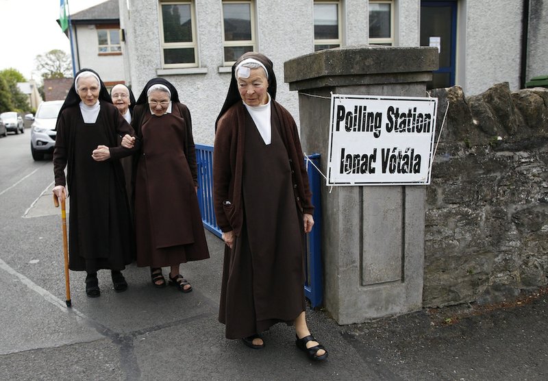 Carmelite sisters leave a polling station in Malahide, County Dublin, Ireland, on Friday, May 22, 2015. Ireland began voting Friday in a referendum on gay marriage which will require an amendment to the Irish constitution. 