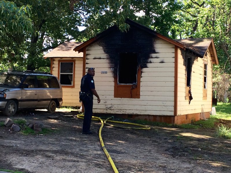 Authorities investigate a fire at 4721 W. 24th St. that left one person dead on Friday, May 22, 2015.