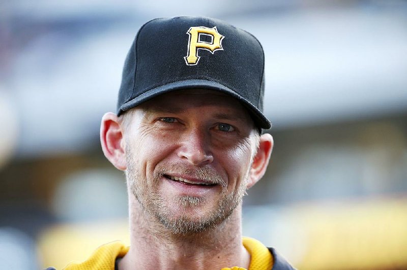 Pittsburgh Pirates starting pitcher A.J. Burnett is interviewed before a baseball game against the Minnesota Twins in Pittsburgh Tuesday, May 19, 2015.