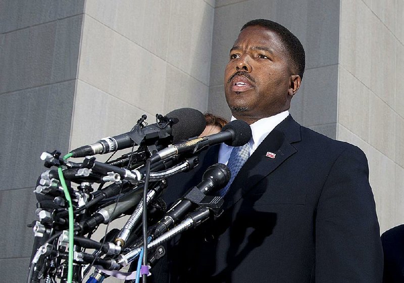 Acting District Attorney Vincent Cohen speaks to reporters Friday outside the District of Columbia Superior Court in Washington, where Daron Dylon Wint had appeared.