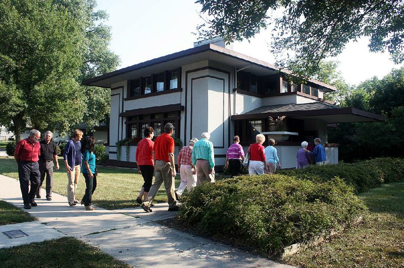 Visitors prepare to tour the Stockman House in Mason City, Iowa, which is the only Frank Lloyd Wright-designed Prairie School architecture house in Iowa. 