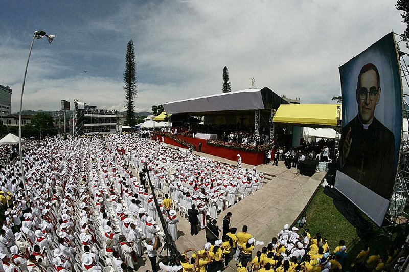 Members of the clergy gather at the front of the stage Saturday during beatification ceremonies for Roman Catholic Archbishop Oscar Romero in San Salvador, El Salvador. 