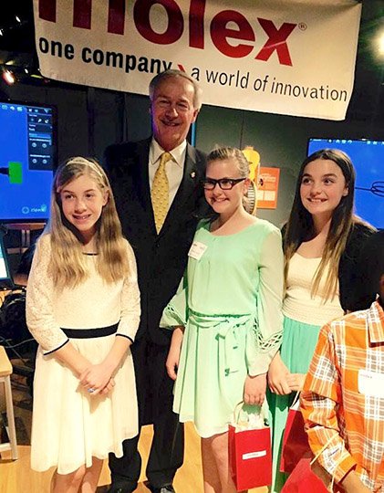Submitted photo Three sixth-grade students from Cutter Morning Star Elementary School were invited to attend an event last month at the Museum of Discovery in Little Rock based on their aptitude in math and science. Gov. Asa Hutchinson, back, was the event's keynote speaker. Cutter students, from left, are Lauren Boston, Mikayla Turner and Brecken Knott-Debord. Their sponsoring teacher is Stacey Boston.