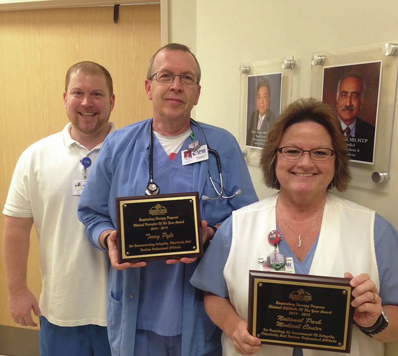 Submitted photo National Park College's 2014-2015 Respiratory Program graduates recently voted National Park Medical Center as their Clinical Affiliate of the Year, and NPMC respiratory therapist Terry Pyle, CRT LRCP, as their Clinical Preceptor of the Year. The awards were given "for demonstrating integrity, objectivity and positive professional attitude." From left are NPMC ICU and Respiratory Manager Joshua Moreland, RN, BSN; Pyle; and Respiratory Department Supervisor Cheryl Jackson, CRT, LRCP.