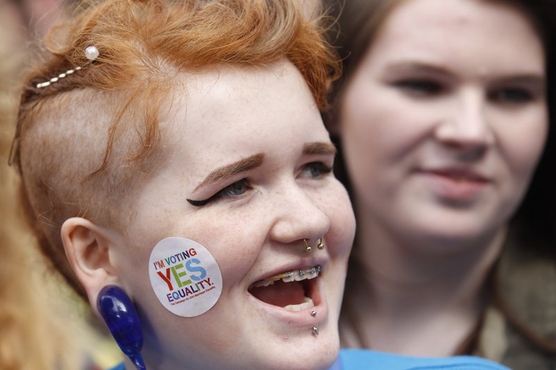 Yes supporters celebrate as the first results start to filter through in the Irish referendum at Dublin, Ireland, Saturday, May 23, 2015. Ireland has voted resoundingly to legalize gay marriage in the world's first national vote on the issue, leaders on both sides of the Irish referendum declared Saturday even as official ballot counting continued. 