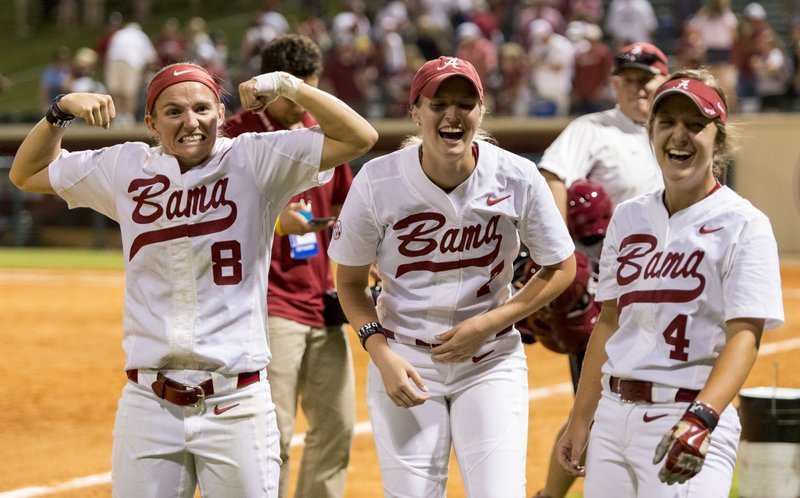 Alabama outfielder Haylie McCleney (8) flexes as Alabama celebrates a 5-3 win over Oklahoma in an NCAA college softball tournament super regional, Saturday, May 23, 2015, in Tuscaloosa, Ala. 