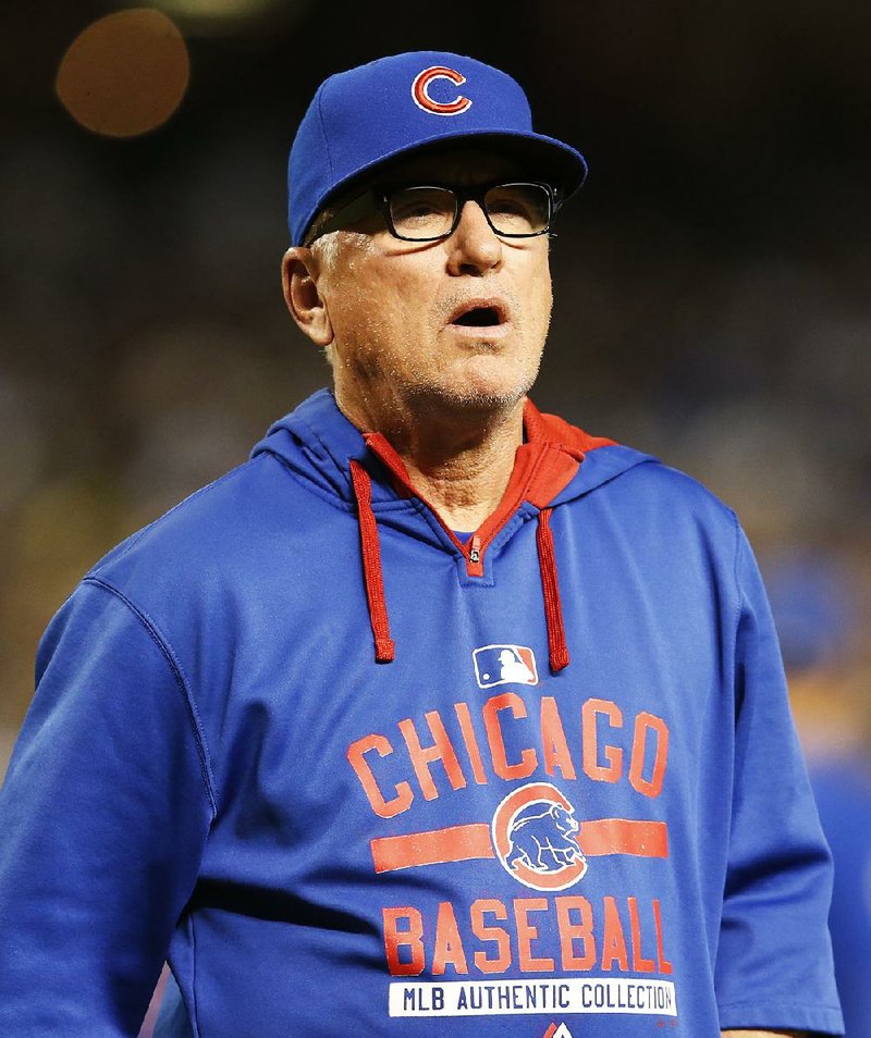 Chicago Cubs manager Joe Maddon in the ninth inning during a baseball game against the Arizona Diamondbacks, Saturday, May 23, 2015, in Phoenix. 