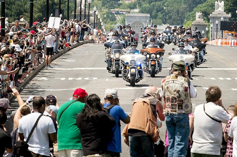 Motorcycle riders cross the Memorial Bridge in Washington on Sunday during the annual Rolling Thunder “Ride for Freedom” Memorial Day weekend event in the nation’s capital. 