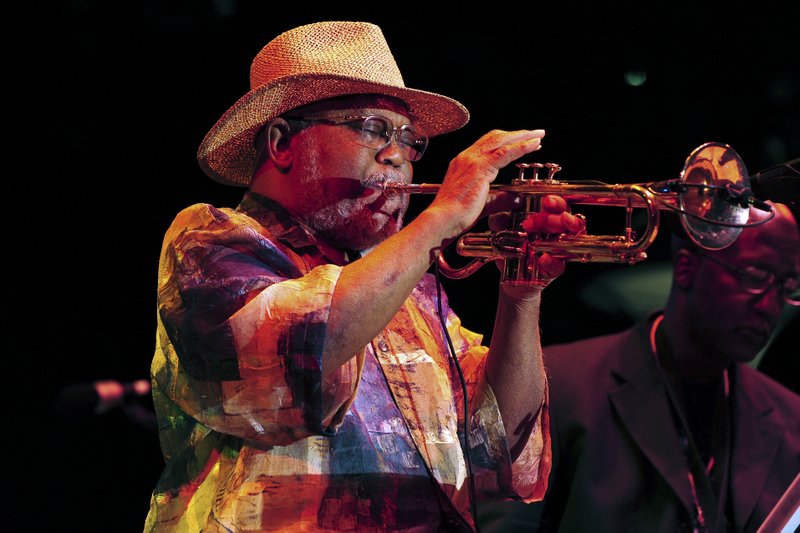 In this Sept. 2, 2012 file photo, trumpeter Marcus Belgrave performs at the 33rd annual Detroit Jazz Festival, in Detroit. Belgrave, a jazz trumpeter who graced stages and studios with Ray Charles, Aretha Franklin, Dizzy Gillespie, Joe Cocker and Motown artists galore, died Sunday, May 24, 2015.