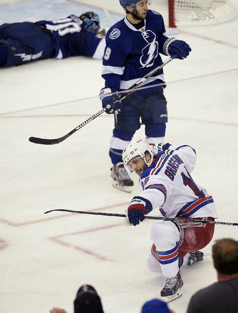 New York center Derick Brassard (16) celebrates one of his three goals against Tampa Boy on Tuesday as the Lightning evened their NHL Eastern Conference finals series at 3-3.