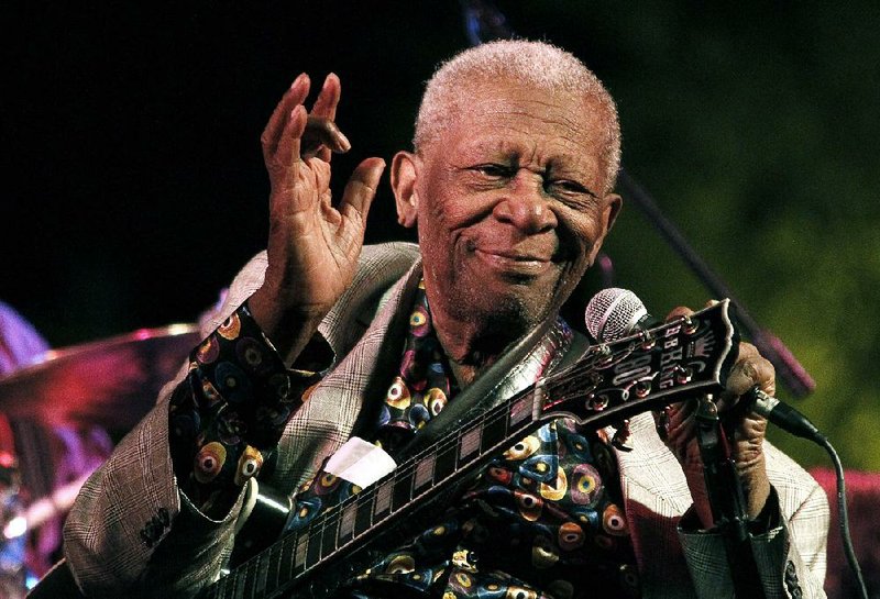 In this Aug. 22, 2012 photograph, the  then 86-year-old B.B. King thrills a crowd of several hundred people at the annual B.B. King Homecoming, a free concert on the grounds of an old cotton gin where he worked as a teenager many years ago, in Indianola, Miss. 