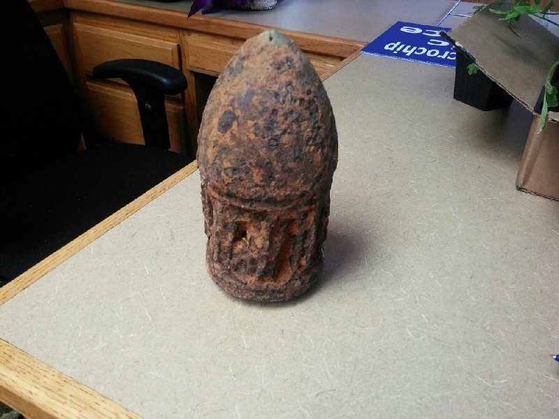 A gas-line worker unearthed this intact Civil War artillery shell in Prairie Grove earlier this month. The 14-pound shell was promptly destroyed by authorities to the chagrin of historians, who say it should have been disarmed and preserved.