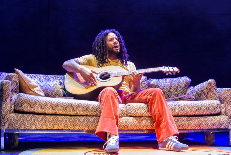 The Associated Press BE HAPPY: This image released by Center Stage shows Mitchell Brunings during a performance of the musical "Marley."