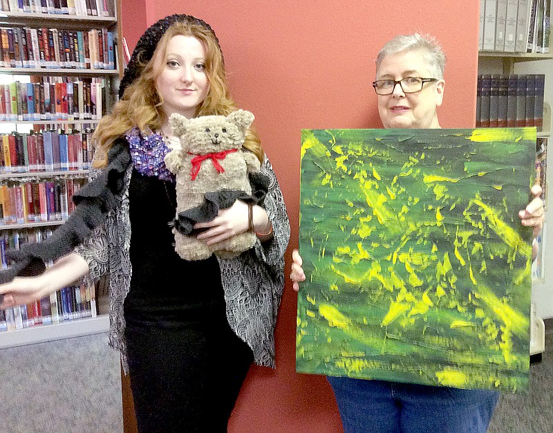 Submitted Bailley Kinser and Susan Santos display a few of the many items to be included in the Arts Extravaganza 2015.