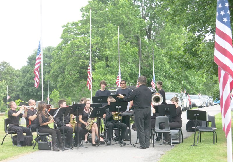 Photo by Susan Holland The Gravette High School band, under the direction of James Hendrix, provided patriotic music for the Memorial Day service. The band played the National Anthem as well as a medley of songs from various branches of the service.