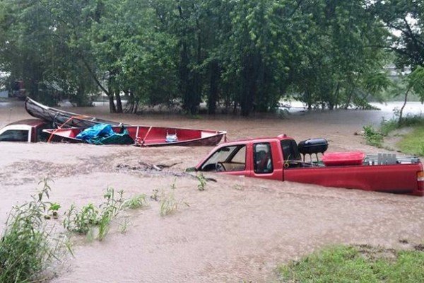 This picture was posted on Facebook on Saturday by Brittany Erin Hollaway. Hollaway was camping along the Illinois River when the water rose overnight, stranding the campers. The group lost two vehicles and everything in them, according to Holloway&#8217;s Gofundmepage, gofundme.com/a4v7z0.