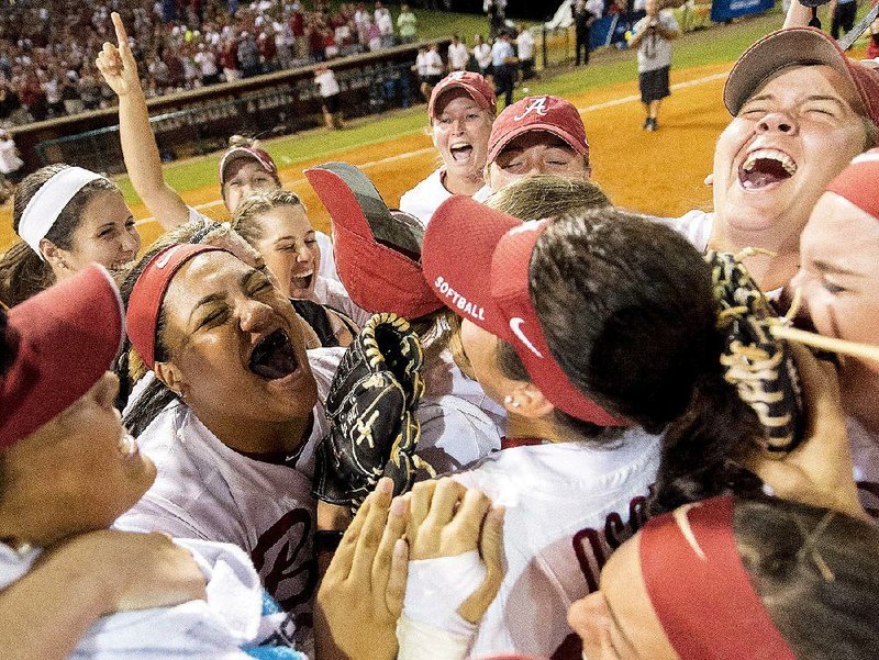 Alabama players celebrate a super regional victory over Oklahoma last Saturday, which guaranteed the Tide a 10th trip to the Women’s College World series this week in Oklahoma City.