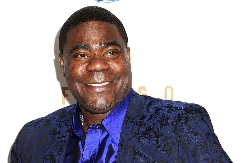 In this April 9, 2014 file photo, actor Tracy Morgan attends the FX Networks Upfront premiere screening of "Fargo" at the SVA Theater in New York. Actor-comedian Morgan has settled his lawsuit against Wal-Mart over a New Jersey highway crash that killed one man and left Morgan and two friends seriously injured.  