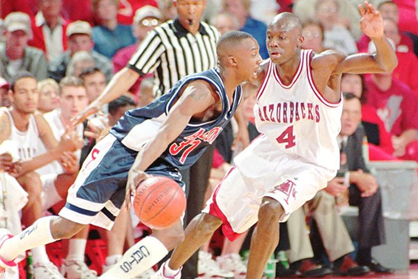 Arkansas' Jesse Pate (4) guards Arizona's Jason Terry (31) during the first half Friday, Nov. 17, 1995, at Bud Walton Arena in Fayetteville. Arkansas' Jesse Pate (4) guards Arizona's Jason Terry (31) during the first half Friday, Nov. 17, 1995, at Bud Walton Arena in Fayetteville.