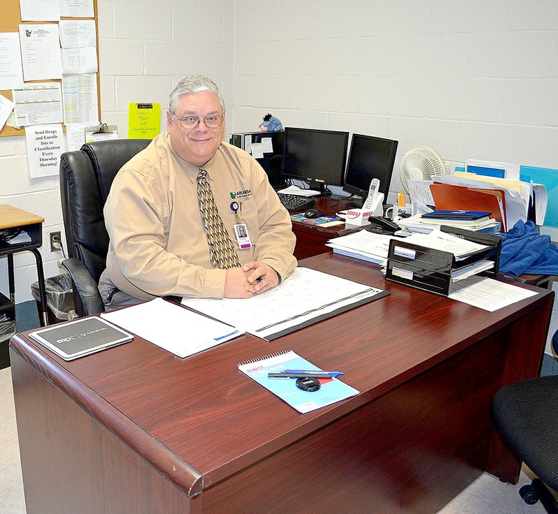 Principal Benny Nettles said he takes pride in helping inmates earn their GED, some as first-generation high school graduates