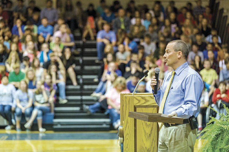 Roger Ried speaks at Southside High School in Batesville during a ceremony in which he and Dion Stevens, two of the district’s principals, received statewide awards for their work in administration.