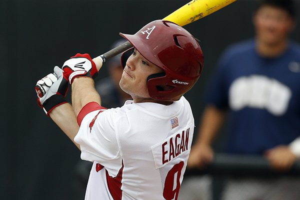 Arkansas's Clark Eagan follows through on a fly out off a pitch from Oral Roberts's Guillermo Trujillo in the second inning of a game at the Stillwater Regional of the NCAA college baseball tournament in Stillwater, Okla., Friday, May 29, 2015. (AP Photo/Sue Ogrocki)