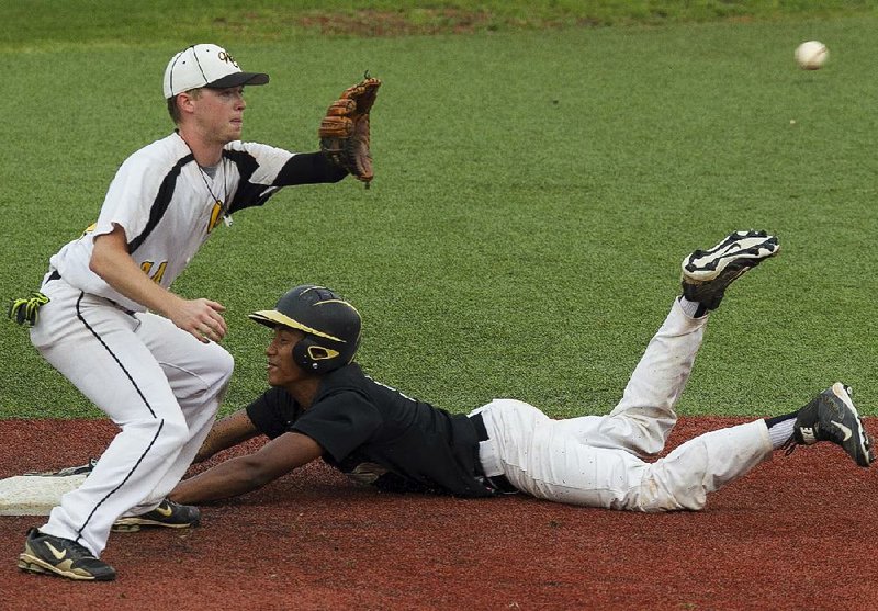 Marcus Bracy, from Pulaski Robinson, steals second base in the fourth inning in the North All-Stars’ 6-5 loss to the South All Stars during Thursday night’s Central Arkansas High School All-Star Game at UALR’s Gary Hogan Field.