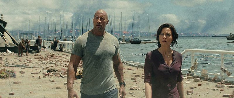 It takes a natural disaster to get helicopter pilot Ray (Dwayne Johnson) and his estranged wife, Emma (Carla Gugino), to talk things out in Brad Peyton’s San Andreas.
