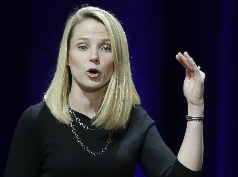 In this Feb. 19, 2015 photo, Yahoo President and CEO Marissa Mayer delivers the keynote address at the first-ever Yahoo Mobile Developer's Conference, in San Francisco. Mayer was the highest paid female CEO in 2014, according to a study carried out by executive compensation data firm Equilar and The Associated Press.