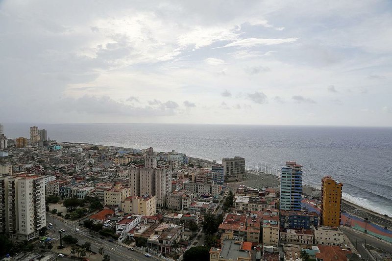 An aerial view shows the coastal skyline of Havana, including the U.S. Interests Section diplomatic mission, the third building from the right, along the shore. 
