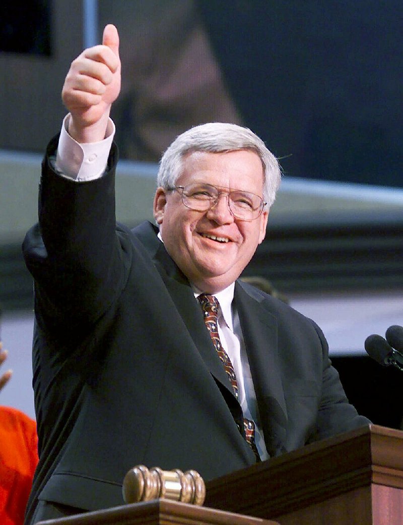In this July 31, 2000 file photo, House Speaker Dennis Hastert of Ill. gives a thumbs up after taking over as chairman of the Republican National Convention in Philadelphia. Hastert’s career as House speaker both arose and ended amid the sex-related scandals of others. Now, eight years after leaving Congress, Hastert’s own legacy is threatened by an indictment charging financial misdeeds _ and cryptically referring to “misconduct” against an unnamed person.  