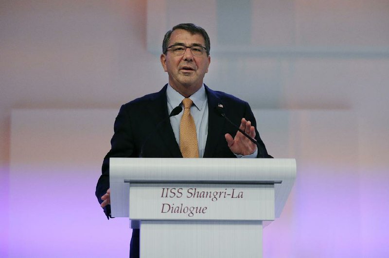 U.S. Secretary of Defense Ashton Carter, in Singapore for an international security summit, said Saturday that China’s land reclamation project is out of step with international rules. 