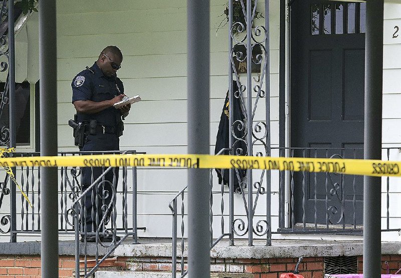 North Little Rock police investigate a homicide Sunday afternoon at 2 Walter Place. Police said Corey Derscheid, 24, was shot to death. Christopher Maines, 45, was arrested and charged with capital murder Sunday night.