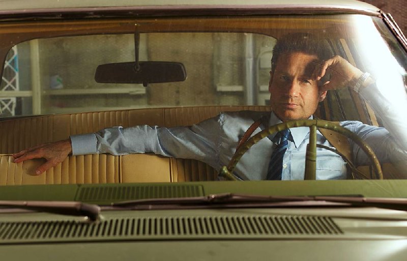 David Duchovny portrays Detective Sam Hodiak in the NBC period crime drama Aquarius. The series airs at 8 p.m. Thursday.
