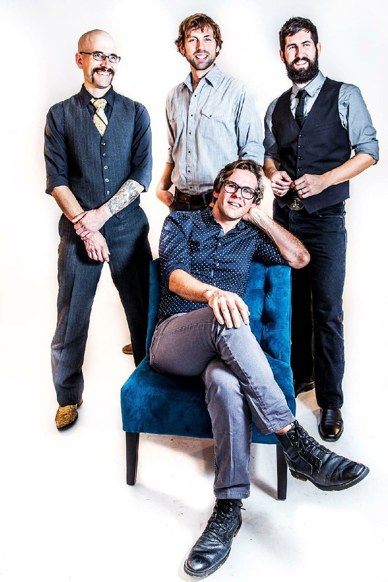 The Steel Wheels are (seated) Trent Wagler, (back row from left) Brian Dickel, Eric Brubaker and Jay Lapp.

